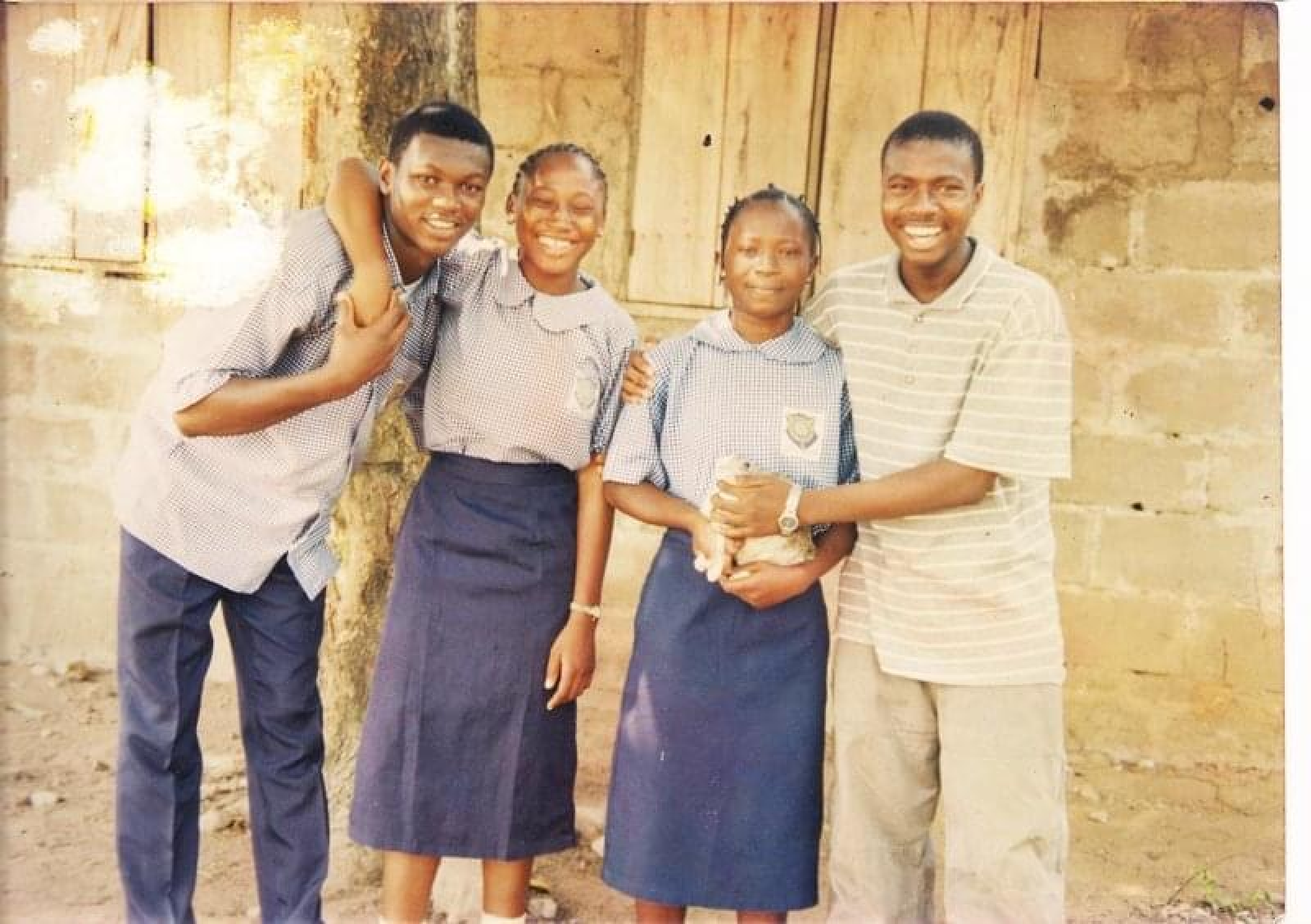 Leslie and fellow students in school uniforms
